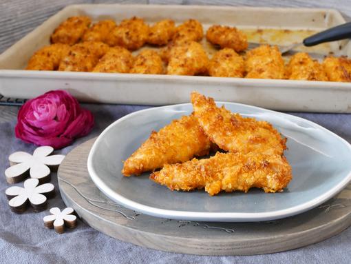 Rezept Chicken Fingers vom Ofenzauberer, Hähnchenfilets auf Teller angerichtet 